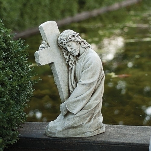 17.75"H JESUS HOLDING CROSS 	GARDEN STATUE