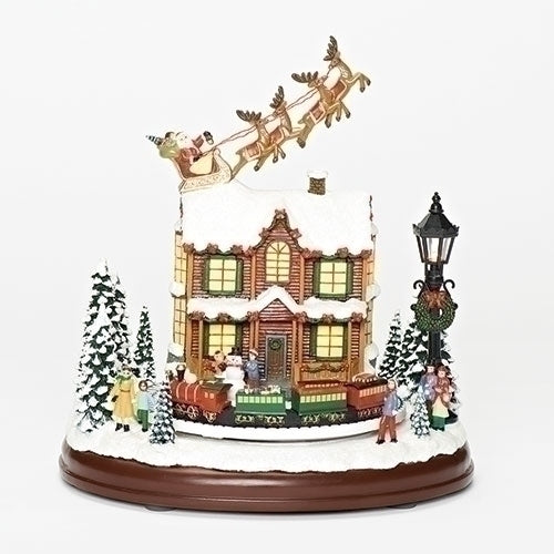 9.25"H MUSICAL LED SANTA OVER HOUSE ROTATING